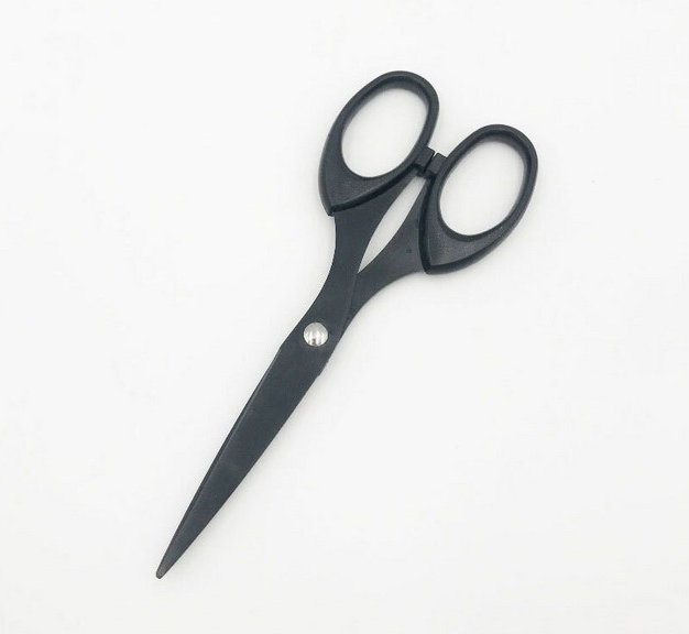 Non-stick scissors for cutting tape